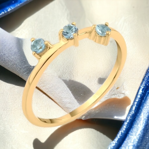 ANILLO DE PLATA CON TOPACIO AZUL